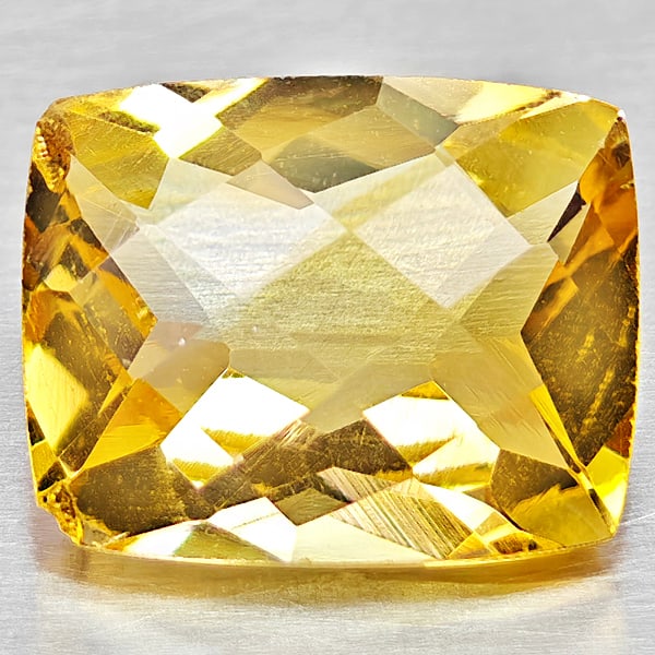 Natural Yellow Citrine Gemstone 2.39 Ct. Cushion Checkerboard Cut 10.1 x 8 Mm.: Product ID: 801815289 Product Name: Natural Citrine Weight: 2.70 CT. Size: 10.1 x 8 x 5.3 MM. Shape: Cushion Checkerboard Color: Yellow Clarity:VSI Luster: Good Gems Origin: Brazil Treatment: Unheated