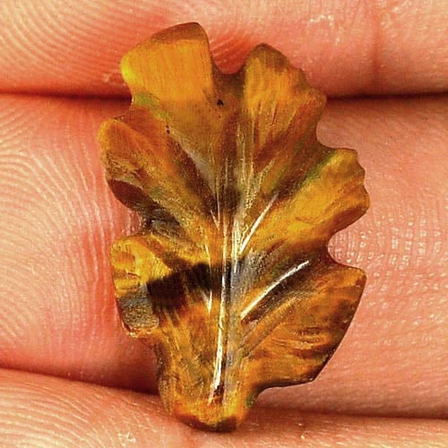 Natural Golden Tiger Eye Gemstones 6.63 Ct. Carving Leaves Shape 18.6 x 12 Mm: Product ID: 811600070 Product Name: Natural Tiger eye Weight: 6.63 CT. Size: 18.6 x 12 x 4.6 MM. Shape: Carving Leaves Color: Golden Clarity:Opaque Luster: Good Gems Origin: Thailand Treatment: Unheat