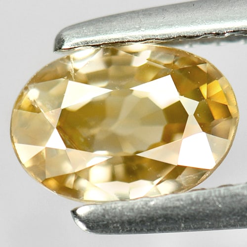 Natural Yellow Zircon Gemstones 1.11 Ct. Oval Shape 7.1 x 5.1 Mm.: Product ID: 807727266 Product Name: Natural Zircon Weight: 1.11 CT. Size: 7.1 x 5.1 x 2.9 MM. Shape: Oval Color: Light Yellow Clarity:SI1 Luster: Good Gems Origin: Cambodia Treatment: Heated Crystal S