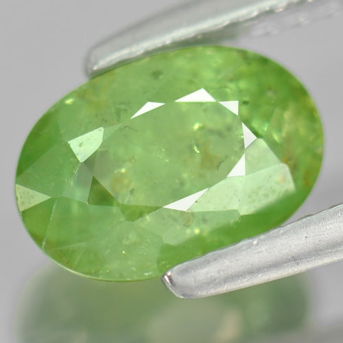 Natural Demantoid Garnet Gemstones 1.68 Ct. Oval Shape 8.2 x 5.6 Mm.: Product ID: 802919252 Product Name: Natural Demantoid Weight: 1.68 CT. Size: 8.2 x 5.6 x 4 MM. Shape: Oval Color: Green Clarity:SI Luster: Good Gems Origin: Madagascar , Africa Treatment: Unheated Cry