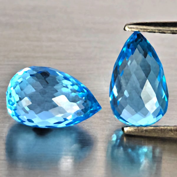 Natural Blue Topaz Gemstones 3.10 Ct. 2 Pcs. Briolette 7.7 x 5.5 Mm.: Product ID: 807151310 Product Name: Natural Blue Topaz Weight: 3.10 CT. Size: 7.7 x 5.5 x 5.5 MM. Shape: Briolette Color: Blue Clarity:VVS Luster: Good Gems Origin: Brazil Treatment: Treated Crystal S