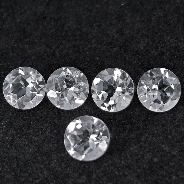 Natural White Topaz Gemstones 5.25 Ct. 5 Pcs. Round Shape 6.3 Mm.: Product ID: 807168796 Product Name: Natural Topaz Weight: 5.25 CT. Size: 6.3 x 6.3 x 4 MM. Shape: Round Color: White Clarity:VSI Luster: Good Gems Origin: Brazil Treatment: Unheated Crystal Structure: