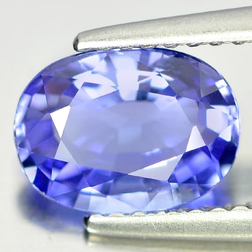 Natural Violetish Blue Tanzanite Gemstones 1.51Ct. Clean Oval Shape 8.56 x 6.34 Mm.: Product ID: 807005454 Product Name: Natural Tanzanite Weight: 1.51 CT. Size: 8.56 x 6.34 x 3.64 MM. Shape: Oval Color: Blue Clarity:IF Luster: Very Good Gems Origin: Tanzania Treatment: Heated Crystal