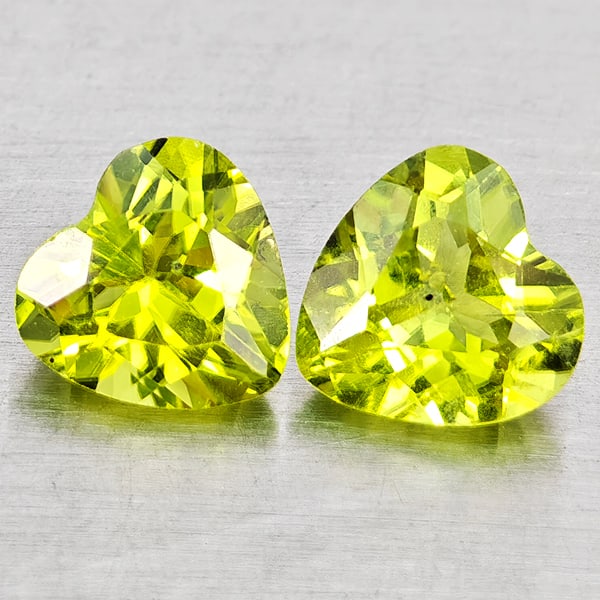 Natural Green Peridot Gemstones 1.57 Ct. 2 Pcs. Heart Shape 6.4 x 6.1 Mm.: Product ID: 805317275 Product Name: Natural Peridot Weight: 1.57 CT. Size: 6.4 x 6.1 x 3.5 MM. Shape: Heart Shape Color: Green Clarity:VSI Luster: Good Gems Origin: Pakistan Treatment: Unheated Crysta
