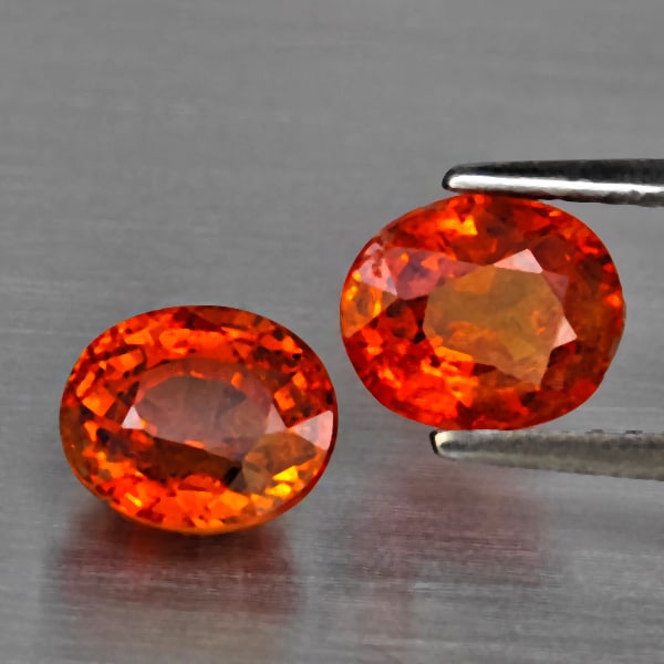 Natural Orangish Red Spessartine Garnet Gemstones 2.99 Ct. 2 Pcs Oval Shape 6.7 x 5.8 Mm.: Product ID: 802937980 Product Name: Natural Garnet Weight: 2.99 CT. Size: 6.7 x 5.8 x 4.4 MM. Shape: Oval Color: Orangish Red Clarity:SI1 Luster: Good Gems Origin: Namibia Treatment: Unheated Crystal 