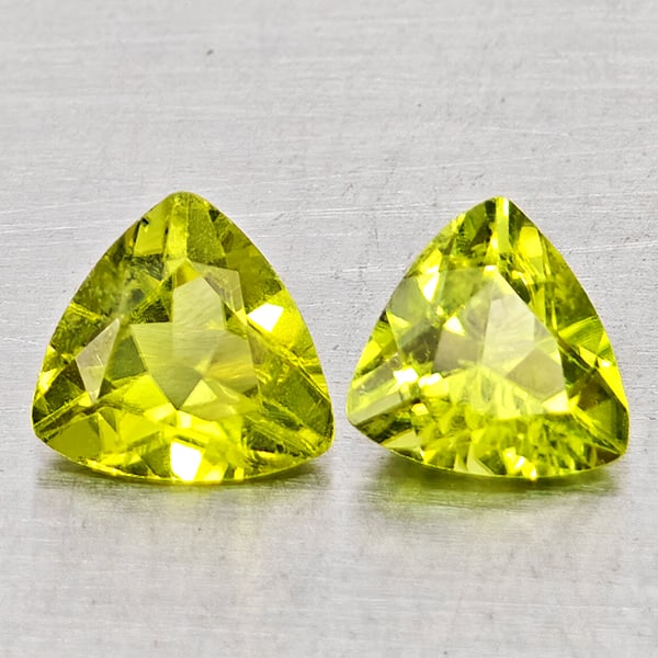 Natural Green Peridot Gemstones 1.24 Ct. 2 Pcs. Trilliant Shape 6 Mm.: Product ID: 805317538 Product Name: Natural Peridot Weight: 1.24 CT. Size: 6 x 6 x 3 MM. Shape: Trilliant Color: Green Clarity:SI1 Luster: Good Gems Origin: Pakistan Treatment: Unheated Crystal Struct