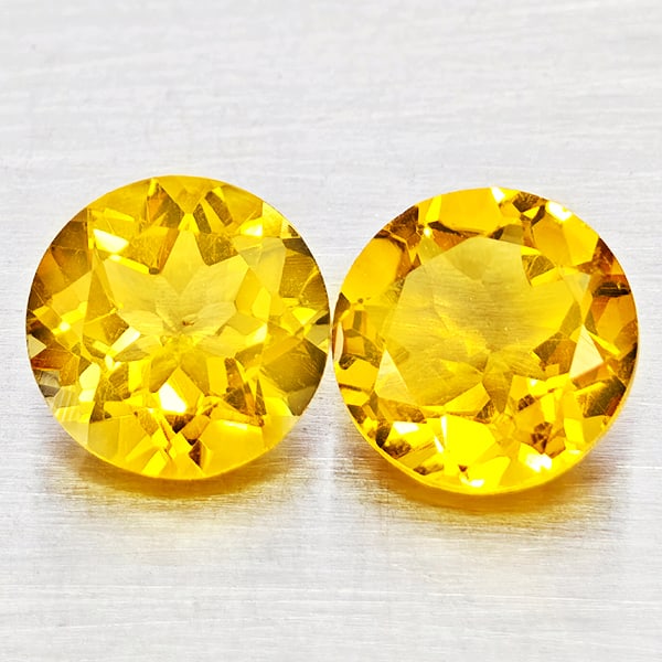 Natural Yellow Citrine Gemstones 2.33 Ct. 2 Pcs. Round Shape 7 Mm.: Product ID: 801815371 Product Name: Natural Citrine Weight: 2.33 CT. Size: 7 x 7 x 4.6 MM. Shape: Round Shape Color: Yellow Clarity:VSI - SI1 Luster: Good Gems Origin: Brazil Treatment: Unheated Cryst