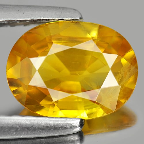Natural Yellow Sapphire Gemstones 1.45 Ct. Oval Shape 8.3 x 6.3 Mm.: Product ID: 806151574 Product Name: Natural Yellow Sapphire Weight: 1.45 CT. Size: 8.3 x 6.3 x 3.2 MM. Shape: Oval Color: Yellow Clarity:SI2 Luster: Good Gems Origin: Thailand Treatment: Heated Crysta