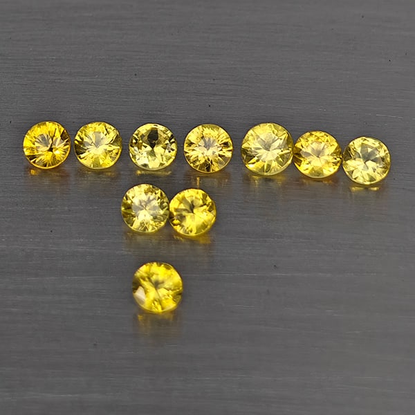 Natural Yellow Songea Sapphire Gemstones 0.48 Ct. 10 Pcs. Round Diamond Cut 2.5 Mm.: Product ID: 806130503 Product Name: Natural Blue Sapphire Weight: 0.48 CT. Size: 2.5 x 2.5 x 1.9 MM. Shape: Round Diamond Cut Color: Yellow Clarity:SI1 Luster: Good Gems Origin: Tanzania Treatment: He