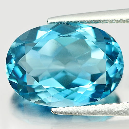 Natural London Blue Topaz Gemstones 7.78 Ct. Clean Oval Shape 14 x 10 Mm.: Product ID: 807165536 Product Name: Natural Blue Topaz Weight: 7.78 CT. Size: 14 x 10 x 6.6 MM. Shape: Oval Color: London Blue Clarity:IF Luster: Good Gems Origin: Brazil Treatment: Treated Crystal St