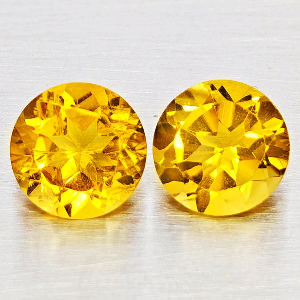 Natural Yellow Citrine Gemstones 2.44 Ct. 2 Pcs Round Shape 7.1 Mm.: Product ID: 801815370 Product Name: Natural Citrine Weight: 2.44 CT. Size: 7.1 x 7.1 x 4.3 MM. Shape: Round Shape Color: Yellow Clarity:VSI - SI1 Luster: Good Gems Origin: Brazil Treatment: Unheated C