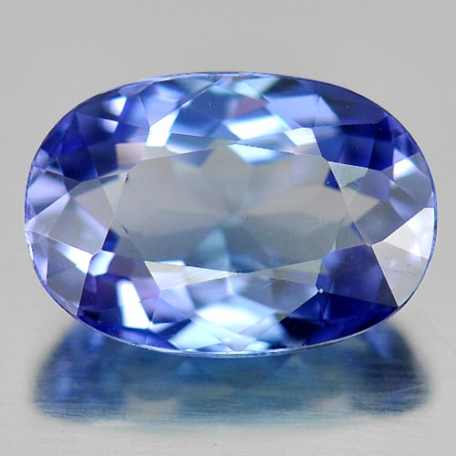 Natural Violetish Blue Tanzanite Gemstones 1.24 Ct. Clean Oval Shape 7.86 x 5.48 Mm.: Product ID: 807005412 Product Name: Natural Tanzanite Weight: 1.24 CT. Size: 7.86 x 5.48 x 3.71 MM. Shape: Oval Color: Blue Clarity:IF Luster: Very Good Gems Origin: Tanzania Treatment: Heated Crystal