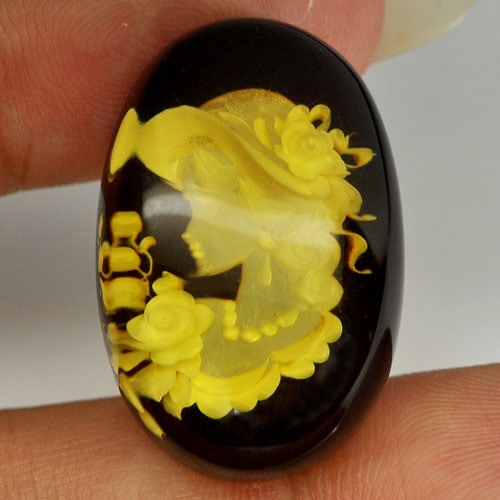 Natural Women In Brown Yellow Amber 14.79 Ct. Oval Cabochon Shape 27 x 18 Mm.: Product ID: 819005175 Product Name: Natural Amber Weight: 14.79 CT. Size: 27 x 18 x 9 MM. Shape: Oval Cabochon Color: Yellow Clarity:Semi - Transparent Luster: Good Gems Origin: Poland Treatment: Unhe
