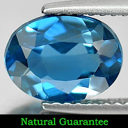 Natural London Blue Topaz Gemstones 2.12 Ct. Oval Shape 9 x 7 Mm.: Product ID: 807161037 Product Name: Natural Blue Topaz Weight: 2.12 CT. Size: 9 x 7 x 4.2 MM. Shape: Oval Color: Blue Clarity:VSI Luster: Good Gems Origin: Brazil Treatment: Treated Crystal Structure:
