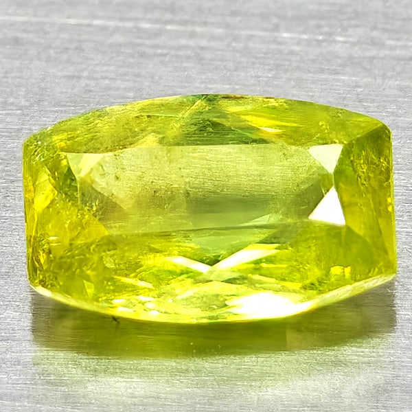 Natural Yellowish Green With Rainbow Spark Sphene Gemstones 0.97 Ct. Cushion Shape 7.4 x 4.8 Mm.: Product ID: 806509053 Product Name: Natural Sphene Weight: 0.97 CT. Size: 7.4 x 4.8 x 2.9 MM. Shape: Cushion Shape Color: Yellowish Green With Rainbow Spark Clarity:SI1 Luster: Good Gems Origin: Madag