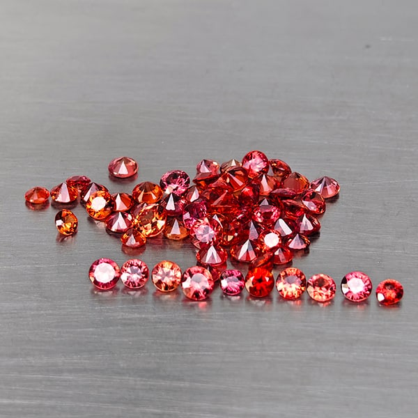Natural Orangish Red Songea Sapphire Gemstones 3.99 Ct. 63 Pcs. Round Diamond Cut and Mixed Size: Product ID: 806130588 Product Name: Natural Yellow Sapphire Weight: 3.99 CT. Size: 2.9 x 2.9 x 1.9 to 2 x 2 x 1.8 MM. Shape: Round Diamond Cut Color: Orangish Red Clarity:VSI Luster: Good Gems Origin: