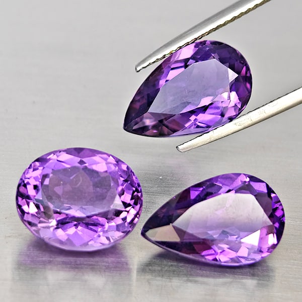 Natural Purple Amethyst Gemstones 13.84 Ct. 3 Pcs. Mixed Shape and Mixed Size: Product ID: 800325716 Product Name: Natural Amethyst Weight: 13.84 CT. Size: 14.4 x 9.3 x 6.3 to 12 x 10.3 x 7.7 MM. Shape: Mixed Shape Color: Purple Clarity:VSI Luster: Good Gems Origin: Brazil Treat
