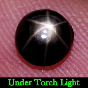Natural Black Star Sapphire Gemstones 1.05 Ct. Round Cabochon Shape 5.4 x 5.2 Mm.: Product ID: 806134770 Product Name: Natural Star Sapphire Weight: 1.05 CT. Size: 5.4 x 5.2 x 3.4 MM. Shape: Round Cabochon Color: Black Clarity:Opaque Luster: Good 6 Rays Star Gems Origin: Thailand Tr