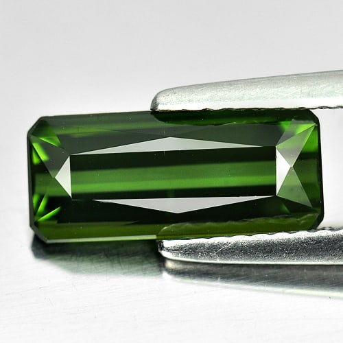 Natural Green Tourmaline Gemstones 2.06 Ct. Octagon Shape 12 x 5.2 Mm.: Product ID: 807240276 Product Name: Natural Tourmaline Weight: 2.06 CT. Size: 12 x 5.2 x 3.7 MM. Shape: Octagon Color: Green Clarity:VSI Luster: Good Gems Origin: Nigeria Treatment: Unheated Crystal S