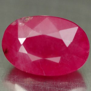 Natural Red Ruby Gematones 0.77 Ct. Oval Shape 9 X 6 Mm.: Product ID: 105901938 Product Name: Natural Ruby Weight: 2.56 CT. Size: 9 X 6 X 5 MM. Shape: OVAL Color: RED Clarity:VSI Luster: GOOD Gems Origin: MADAGASCAR Treatment: HEATED Crystal Structure: Trigo