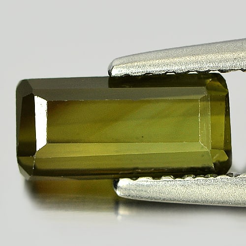 Natural Green Tourmaline Gemstones 1.21 Ct. Octagon Shape 8.4 x 4 Mm.: Product ID: 807240649 Product Name: Natural Tourmaline Weight: 1.21 CT. Size: 8.4 x 4 x 3.3 MM. Shape: Octagon Color: Green Clarity:VSI Luster: Good Gems Origin: Nigeria Treatment: Unheated Crystal St