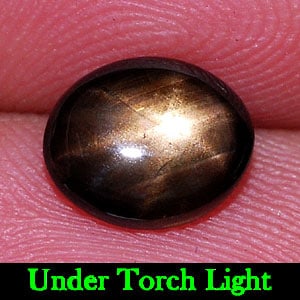 Natural Black Star 6 Rays Sapphire Gemstones 1.90 Ct. Oval Shape 8.4 x 7 Mm.: Product ID: 806132777 Product Name: Natural Star Sapphire Weight: 1.90 CT. Size: 8.4 x 7 x 3 MM. Shape: Oval Cabochon Color: Black Clarity:Opaque Luster: Good 6 Rays Star Gems Origin: Thailand Treatme