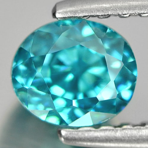 Natural Blue Zircon Gemstones 1.28 Ct. Clean Oval Shape 5.2 x 4.5 Mm.: Product ID: 807713066 Product Name: Natural Zircon Weight: 1.28 CT. Size: 5.2 x 4.5 x 4.9 MM. Shape: Oval Color: Blue Clarity:IF Luster: Good Gems Origin: Cambodia Treatment: Heated Crystal Structure: