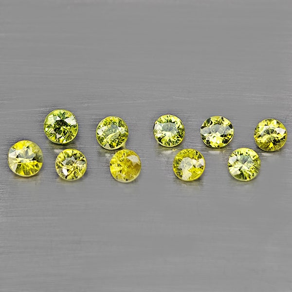 Natural Green Demantiod Garnet Gemstones 1.53 Ct.10 Pcs. Round Diamond Cut 3.2 Mm.: Product ID: 802937741 Product Name: Natural Demantoid Weight: 1.53 CT. Size: 3.2 x 3.2 x 2 MM. Shape: Round Diamond Cut Color: Green Clarity:SI1 Luster: Good Gems Origin: Madagascar Treatment: Unheate