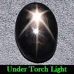 Natural Black Star Sapphire 6 Rays Gemstones 1.46 Ct. Oval Cabochon 7.3 x 5.2 Mm.: Product ID: 806122453 Product Name: Natural Star Sapphire Weight: 1.46 CT. Size: 7.3 x 5.2 x 3.6 MM. Shape: Oval Cabochon Color: Black Clarity:Opaque Luster: Good 6 Rays Star Gems Origin: Thailand Tre