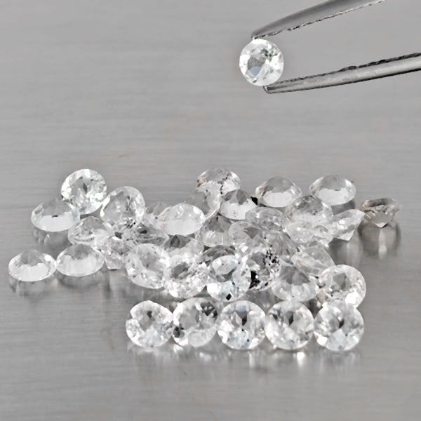 Natural White Topaz Gemstones 10.61 Ct. 38 Pcs. Round Shape 4 Mm.: Product ID: 807169120 Product Name: Natural Topaz Weight: 10.61 CT. Size: 4 x 4 x 2.7 MM. Shape: Round Shape Color: White Clarity:VSI - SI1 Luster: Good Gems Origin: Brazil Treatment: Treated Crystal 