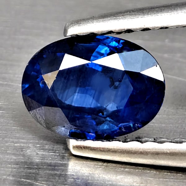 Natural Blue Sapphire Gemstones 0.95 Ct. Oval Shape 6.8 x 5 Mm.: Product ID: 806130546 Product Name: Natural Blue Sapphire Weight: 0.95 CT. Size: 6.8 x 5 x 3.1 MM. Shape: Oval Shape Color: Blue Clarity:VVS - VSI Luster: Good Gems Origin: Madagascar Treatment: Norma