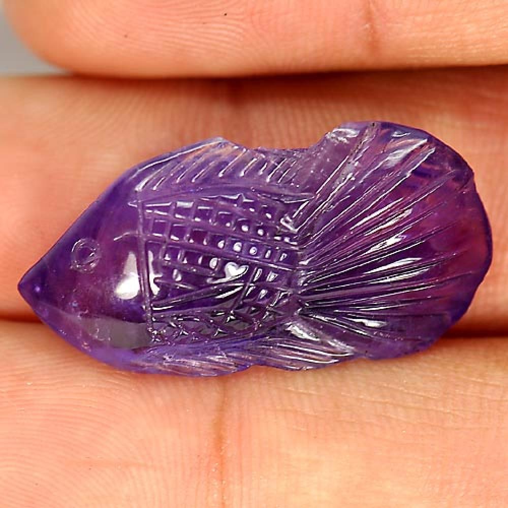 Natural Purple Amethyst Gemstones 20.73 Ct. Fish Carving Shape 29 x 14.8 Mm.: Product ID: 810302848 Product Name: Natural Amethyst Weight: 20.73 CT. Size: 29 x 14.8 x 8.5 MM. Shape: Fish Carving Color: Purple Clarity:Semi - Transparent Luster: Good Gems Origin: Brazil Treatment