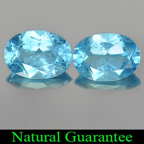 Natural Swiss Blue Topaz Gemstones 1.88 Ct. 2 Pcs. Oval Shape 7 x 5 Mm.: Product ID: 807163916 Product Name: Natural Blue Topaz Weight: 1.88 CT. Size: 7 x 5 x 3.2 MM. Shape: Oval Color: Swiss Blue Clarity:VSI Luster: Good Gems Origin: Brazil Treatment: Treated Crystal Stru