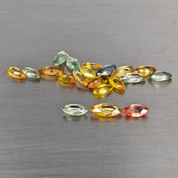 Natural Fancy Color Songea Sapphire 2.51 Ct. 20 Pcs. Marquise Shape and Mixed Size: Product ID: 806130585 Product Name: Natural Sapphire Weight: 2.51 CT. Size: 6 x 2.9 x 1.5 to 3.9 x 2 x 1.3 MM. Shape: Marquise Shape Color: Fancy Color Clarity:VSI Luster: Good Gems Origin: Tanzania T
