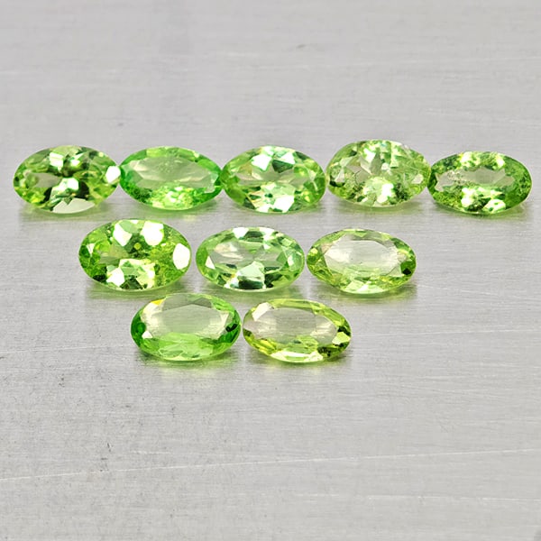 Natural Green Tsavorite Garnet Gemstones 2.14 Ct. 10 Pcs. Oval Shape: Product ID: 803005076 Product Name: Natural Tsavorite Weight: 2.14 CT. Size: 5.2 x 3.2 x 2.1 to 4.9 x 3 x 1.5 MM. Shape: Oval Shape Color: Green Clarity:SI Luster: Good Gems Origin: Tanzania Treatment