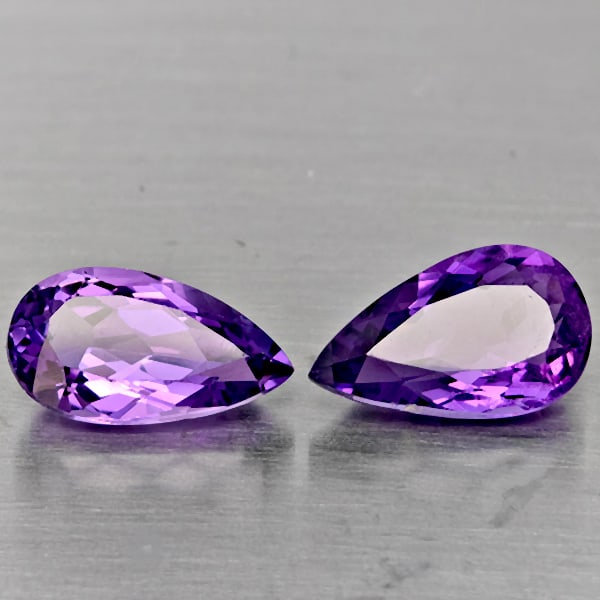 Natural Purple Amethyst Gemstones 5.85 Ct. 2 Pcs. Pear Shape 13 x 7.9 Mm.: Product ID: 800325616 Product Name: Natural Amethyst Weight: 5.85 CT. Size: 13 x 7.9 x 5.7 MM. Shape: Pear Shape Color: Purple Clarity:VSI Luster: Good Gems Origin: Brazil Treatment: Unheated Crystal 