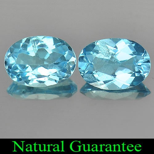 Natural Swiss Blue Topaz Gemstones 1.79 Ct. 2 Pcs. Oval Shape 7 x 5 Mm.: Product ID: 807163908 Product Name: Natural Blue Topaz Weight: 1.79 CT. Size: 7 x 5 x 3.4 MM. Shape: Oval Color: Swiss Blue Clarity:VSI Luster: Good Gems Origin: Brazil Treatment: Treated Crystal Stru