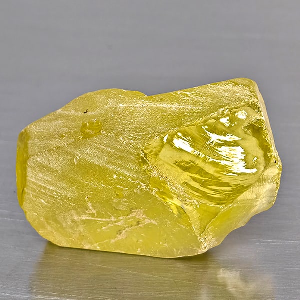 Natural Yellow QuartzGemstones 31.14 Ct. Rough Brazil 20.5 x 19 Mm.: Product ID: 805523878 Product Name: Natural Rough Weight: 31.14 CT. Size: 20.5 x 19 x 16 MM. Shape: Rough Color: Yellow Clarity:Semi - Transparent Luster: Good Gems Origin: Brazil Treatment: Unheated 