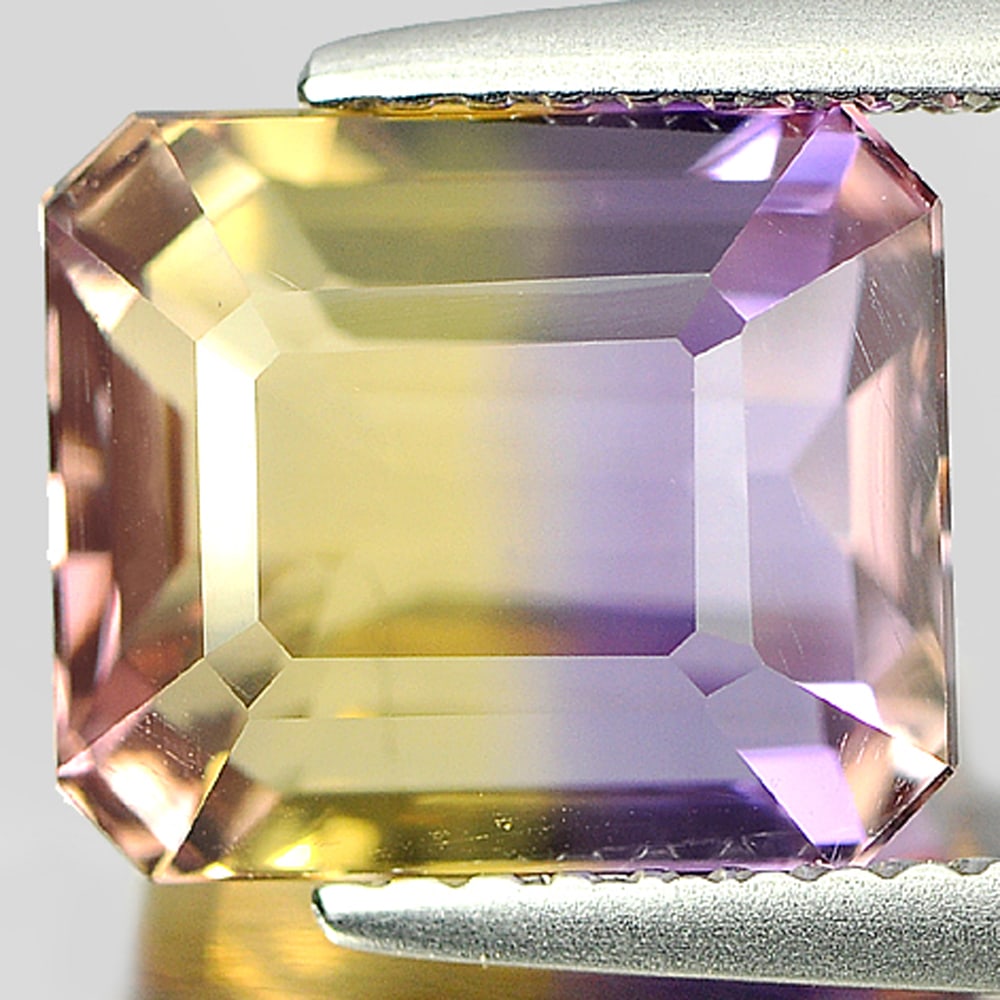 Natural Bi Color Ametrine Gemstones 3.99 Ct. Octagon Shape 9.7 x 8.2 Mm.: Product ID: 800405146 Product Name: Natural Ametrine Weight: 3.99 CT. Size: 9.7 x 8.2 x 6.2 MM. Shape: Octagon Color: Bi Color Clarity:VVS Luster: Good Gems Origin: Bolivia Treatment: Unheated Crystal