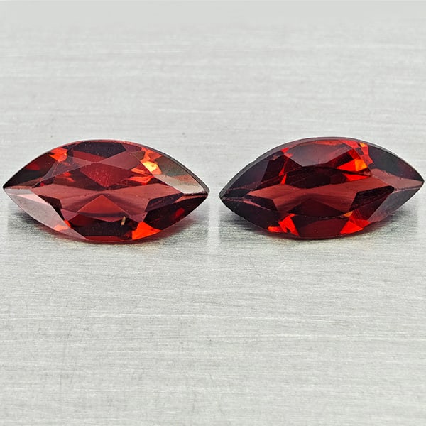 Natural Orangish Red Garnet Gemstones 2.24 Ct. 2 Pcs. Marquise Shape 5 x 10 Mm.: Product ID: 802937010 Product Name: Natural Garnet Weight: 2.24 CT. Size: 5 x 10 x 2.8 MM. Shape: Marquise Shape Color: Orangish Red Clarity:VVS - VSI Luster: Good Gems Origin: Tanzania Treatment: Unh