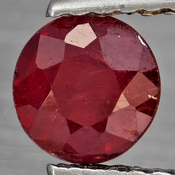 Natural Pinkish Red Ruby Gemstones 0.84 Ct. Round Shape 5.3 Mm.: Product ID: 805935880 Product Name: Natural Ruby Weight: 0.84 CT. Size: 5.3 x 5.3 x 3.5 MM. Shape: Round Color: Pinkish Red Clarity:SI1 Luster: Good Gems Origin: Madagascar Treatment: Heated (Lead-gla