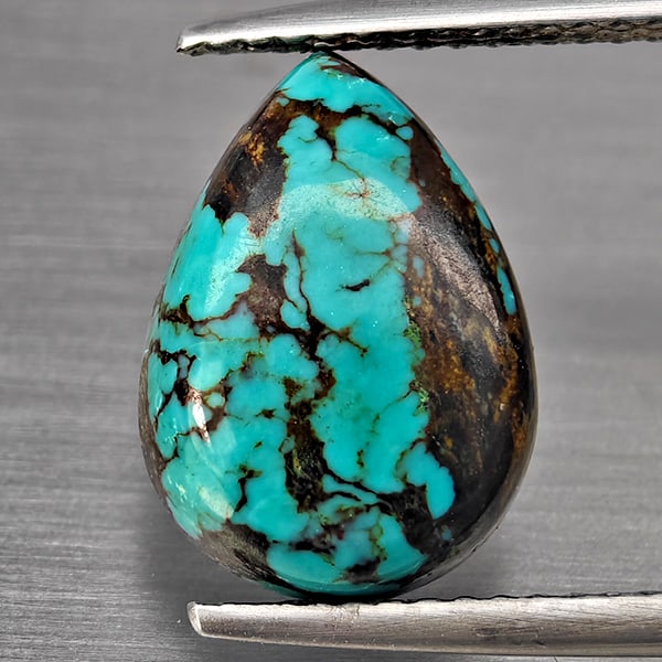Natural Multi Color Green Turquoise Gemstones 3.79 Ct. Pear Shape Cabochon 13.2 x 9.5 Mm.: Product ID: 809100005 Product Name: Natural Gemstones Weight: 3.79 CT. Size: 13.2 x 9.5 x 4.5 MM. Shape: Pear Cabochon Shape Color: Multi Color Green Clarity:Opaque Luster: Good Gems Origin: India Tre