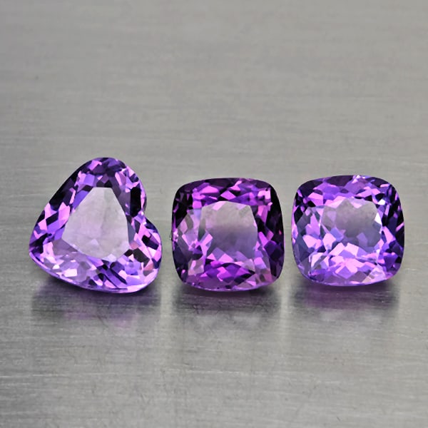 Natural Purple Amethyst Gemstones 7.93 Ct. 3 Pcs. Mixed Shape and Mixed Size: Product ID: 800325710 Product Name: Natural Amethyst Weight: 7.93 CT. Size: 10.2 x 9.5 x 5.6 to 8.5 x 8.5 x 6.1 MM. Shape: Mixed Shape Color: Purple Clarity:VSI Luster: Good Gems Origin: Brazil Treatm