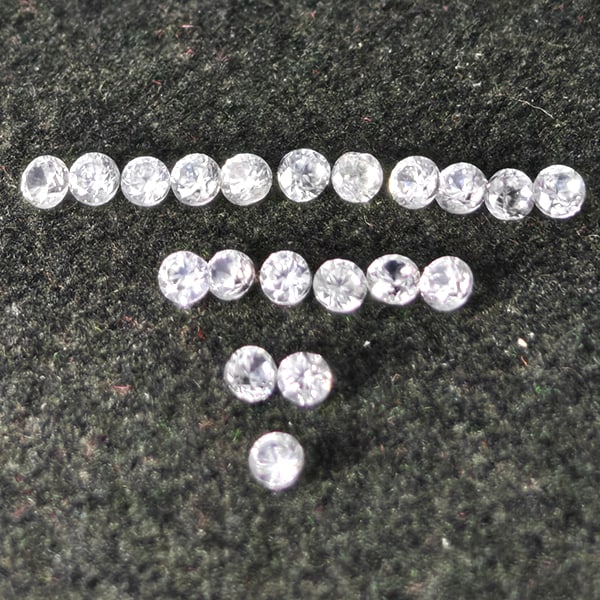 Natural White Zircon Gemstones 0.81 Ct. 20 Pcs. Round Diamond Cut 1.8 Mm.: Product ID: 807743133 Product Name: Natural Zircon Weight: 0.81 CT. Size: 1.8 x 1.8 x 1.3 MM. Shape: Round Diamond Cut Color: White Clarity:VSI Luster: Good Gems Origin: Cambodia Treatment: Heated Cry