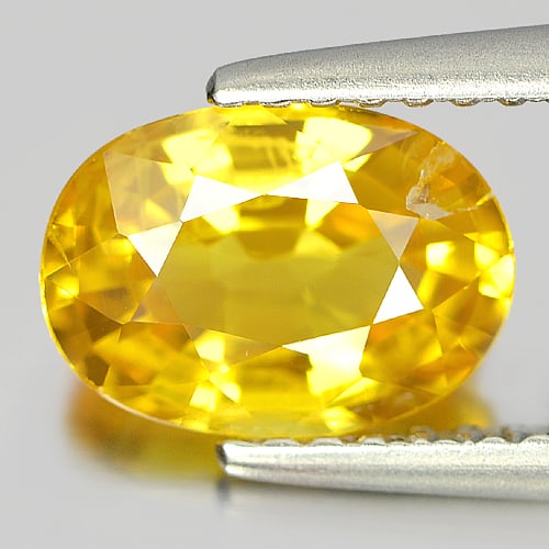 Natural Yellow Sapphire Gemstones 1.80 Ct. Oval Shape 8.6 x 6.2 Mm.: Product ID: 806151547 Product Name: Natural Yellow Sapphire Weight: 1.80 CT. Size: 8.6 x 6.2 x 4 MM. Shape: Oval Color: Yellow Clarity:SI1 Luster: Good Gems Origin: Thailand Treatment: Heated Crystal 
