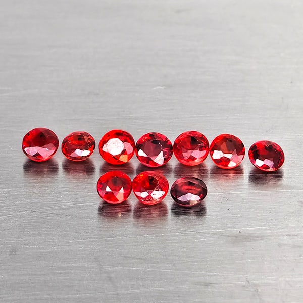 Natural Orangish Red Songea Sapphire Gemstones 1.34 Ct. 10 Pcs. Round Shape 2.5 Mm.: Product ID: 806130601 Product Name: Natural Red Sapphire Weight: 1.34 CT. Size: 2.5 x 2.5 x 1.5 MM. Shape: Round Shape Color: Orangish Red Clarity:VSI Luster: Good Gems Origin: Tanzania Treatment: Hea