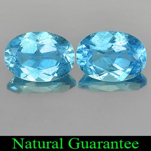 Natural Swiss Blue Topaz Gemstones 1.93 Ct. 2 Pcs. Oval Shape 7 x 5 Mm.: Product ID: 807163910 Product Name: Natural Blue Topaz Weight: 1.93 CT. Size: 7 x 5 x 3.4 MM. Shape: Oval Color: Swiss Blue Clarity:VSI Luster: Good Gems Origin: Brazil Treatment: Treated Crystal Stru