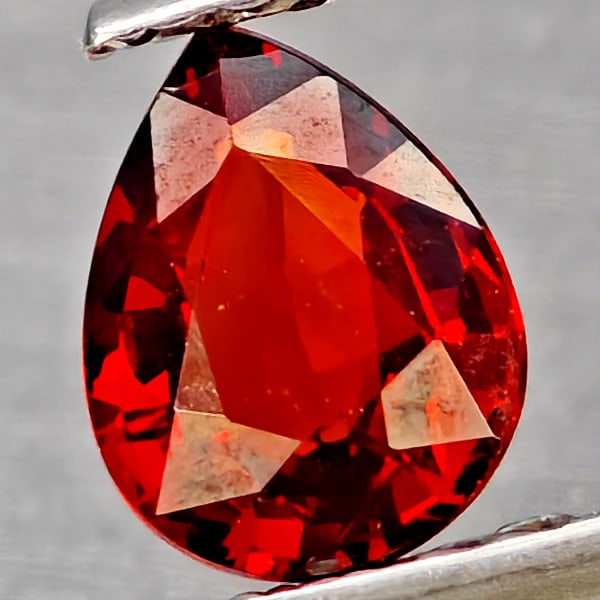 Natural Orangish Red Spessartine Garnet Gemstones 1.20 Ct. Pear Shape 6.8 x 6 Mm.: Product ID: 802937350 Product Name: Natural Garnet Weight: 1.20 CT. Size: 6.8 x 6 x 3.5 MM. Shape: Pear Shape Color: Orangish Red Clarity:SI1 Luster: Very Good Gems Origin: Namibia Treatment: Unheated