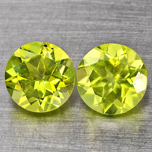 Natural Green Peridot Gemstones 1.42 Ct. 2 Pcs. Round Shape 5.2 Mm.: Product ID: 805317682 Product Name: Natural Weight: 1.42 CT. Size: 5.2 x 5.2 x 3.5 MM. Shape: Round Shape Color: Green Clarity:VSI Luster: Good Gems Origin: Pakistan Treatment: Unheated Crystal Struct