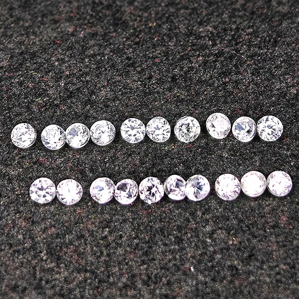 Natural White Zircon Gemstones 0.81 Ct. 20 Pcs. Round Diamond Cut 1.8 Mm.: Product ID: 807743136 Product Name: Natural Zircon Weight: 0.81 CT. Size: 1.8 x 1.8 x 1.3 MM. Shape: Round Diamond Cut Color: White Clarity:VSI Luster: Good Gems Origin: Cambodia Treatment: Heated Cry
